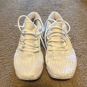 Under Armor women’s size 9 all white sneaker.